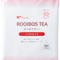 A white and pink package of TeaLife Rooibos Tea (101 Bags, Non-Caffeinated, Cold Brew), imported from Japan and featuring Japanese text, is labeled as caffeine-free. The design includes a heart symbol with “Thank you! 10 years over!” at the top right.