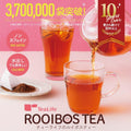 TeaLife Rooibos Tea advertisement with glasses of tea and a tea bag on a pink background